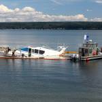 Global Diving and Salvage works to get the 65-foot yacht Silver Lining floating Wednesday. The yacht struck an unknown object and partially sank Tuesday night near the Hood Canal Bridge. (Zach Jablonski / Peninsula Daily News)