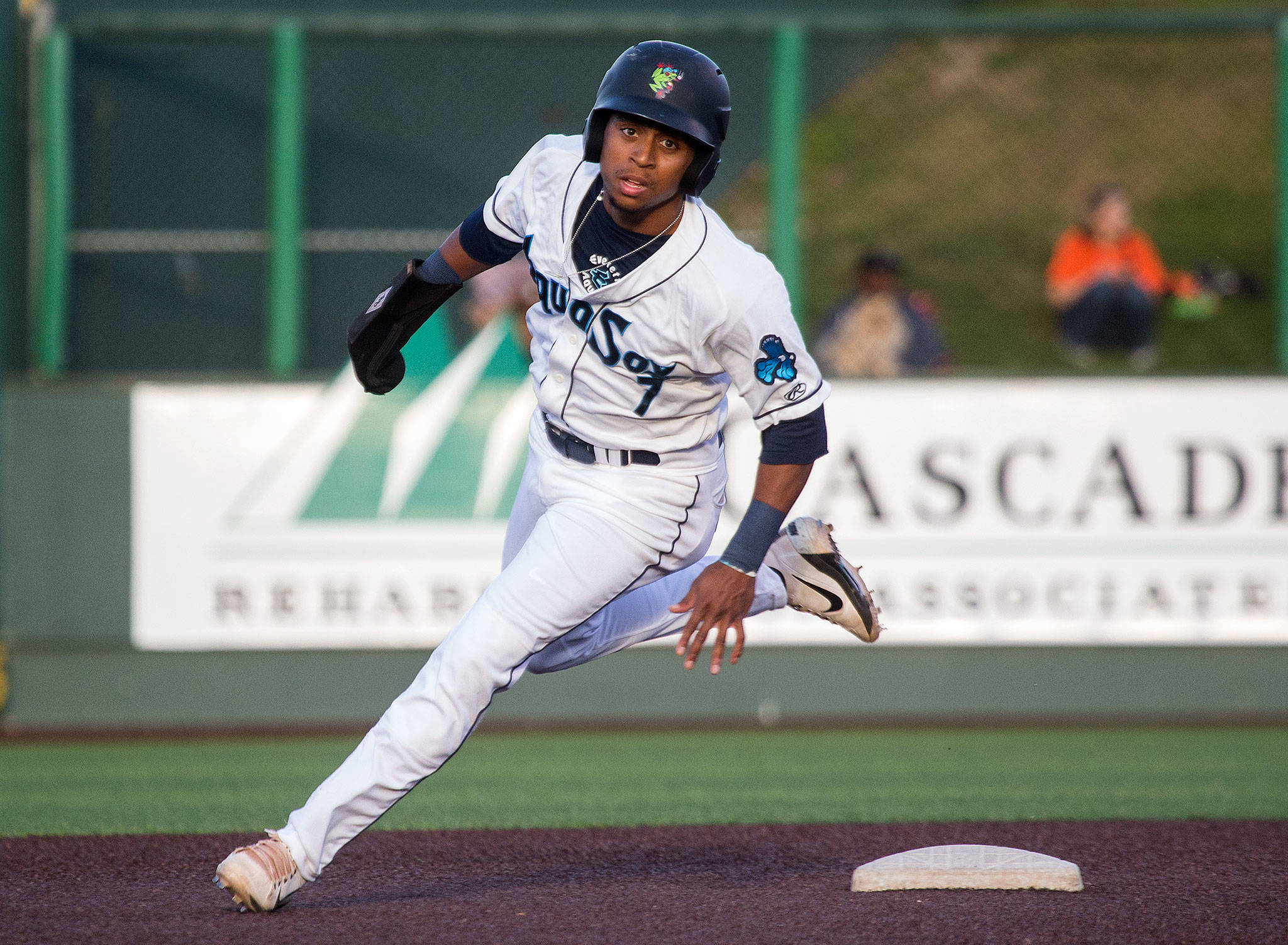 The AquaSoxs DeAires Moses rounds second base during a game against the Spokane Indians on July 22 at Funko Field in Everett. (Andy Bronson / The Herald)