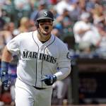 The Mariners Daniel Vogelbach reacts after hitting a solo home run during the fifth inning of a game against the Rangers on July 24, 2019, in Seattle. (AP Photo/Ted S. Warren)