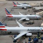 This July 17 photo shows American Airlines planes at Phoenix Sky Harbor International Airport in Phoenix. (AP Photo/Ross D. Franklin)