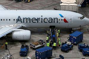 American expects grounded jet to cut profit by $400 million