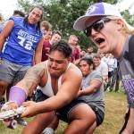 North Creeks Koli Faaiu pulls in the finals of the lineman tug-of-war competition. (Kevin Clark / The Herald)
