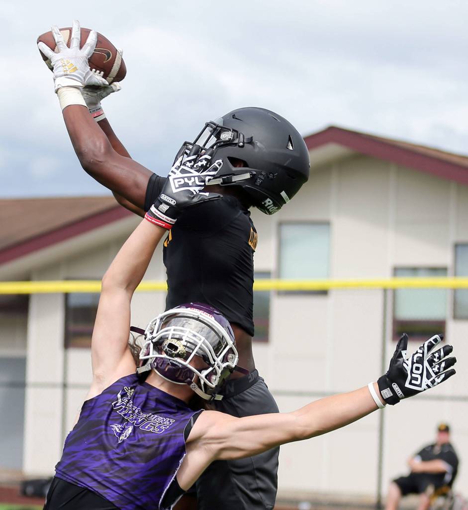 Lake Stevens play Lincoln in the quarterfinals Saturday afternoon during the Cougar Championship Passing Tournament at Lakewood High School in Marysville on July 27, 2019. (Kevin Clark / The Herald)