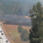 A brush fire along the northbound lanes of I-5 near Arlington caused a 3-mile backup for traffic around noon Sunday. (Washington State Department of Transportation)