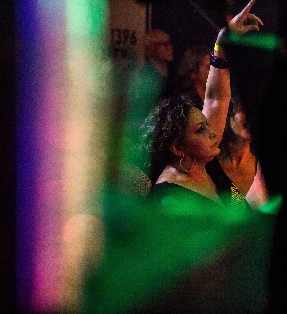 A fan watches Nite Waves show at Tony Vs Garage. (Olivia Vanni / The Herald)