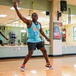 Mike Dixon prepares new steps for a Zumba class at the Mukilteo YMCA. He recently was certified as an instructor and has been training to have his own class. (Kevin Clark / The Herald)