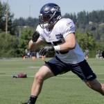 Seattles Ben Burr-Kirven participates in a drill during the Seahawks July 29 training camp practice in Renton. (AP Photo/Ted S. Warren)