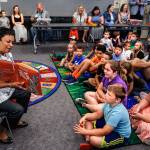 Librarian of Congress Carla Hayden reads Its Only Stanley by Jon Mgee to youngsters while visiting Sno-Isles Marysville Library last week with Congressman Rick Larsen. Appointed by President Barack Obama, Hayden is the first woman and first African-American to hold the position. (Dan Bates / The Herald)