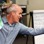 In lively fashion, Congressman Rick Larsen takes a question from one of several dozen kids listening to him read the illustrated book Penguinaut! on Thursday at Sno-Isles Marysville Library while visiting with Librarian of Congress Carla Hayden. (Dan Bates / The Herald)