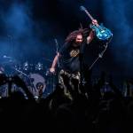 Pigeons Playing Ping Pong vocalist and guitarist raises his instrument in the air after their performance during the first day of Summer Meltdown on Thursday, Aug. 1, 2019 in Darrington, Wash. (Olivia Vanni / The Herald)