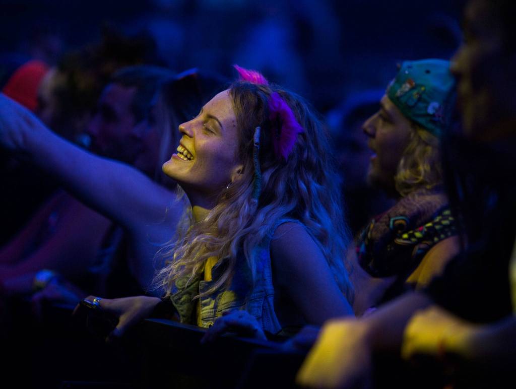 A festival goer dances during Pigeons Playing Ping Pong performance during the first day of Summer Meltdown on Thursday, Aug. 1, 2019 in Darrington, Wash. (Olivia Vanni / The Herald)