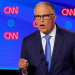 Campaigning for president, governor is gone half the time