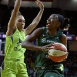 Seattles Jewell Loyd drives with Dallas Brooke McCarty-Williams during a game on Aug. 8, 2019, at Angel of the Winds Arena in Everett. (Kevin Clark / The Herald)