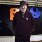 Greek sculptor Takis poses in front of his artwork at a metro station in Athens in 2001. (Stratos Chavalezis/Eurokinissi via AP)