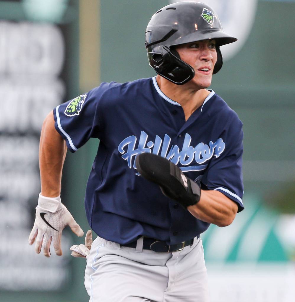 Hillsboros Corbin Carroll runs to third base during the Hops 10-1 win over the Everett AquaSox on Sunday at Funko Field in Everett. (Kevin Clark / The Herald)