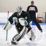 Silvertips goaltender Dustin Wolf skates backward as he trains with his goalie coach, James Jensen, at the Lynnwood Ice Center on July 18, 2019 in Lynnwood. (Andy Bronson / The Herald)