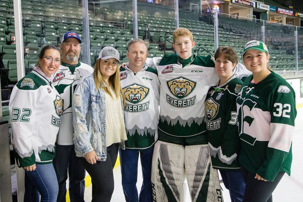 The Wolf family from left to right posing during Parents weekend at Angel of the Winds Arena in Everett: Aunt Starr, Uncle Ken, cousin Shea, father Mike, Dustin, mother Michelle and cousin Erin. (Photo courtesy of the Wolf family)
