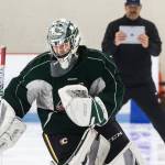 Silvertips goaltender Dustin Wolf skates backwards as he trains with his goalie coach James Jensen at Lynnwood Ice Center on Thursday, July 18, 2019 in Lynnwood, Wash. (Andy Bronson / The Herald)