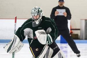 Silvertips goaltender Dustin Wolf skates backwards as he trains with his goalie coach James Jensen at Lynnwood Ice Center on Thursday, July 18, 2019 in Lynnwood, Wash. (Andy Bronson / The Herald)