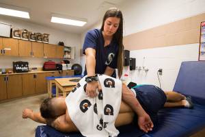 AquaSox female athletic trainer breaking down barriers