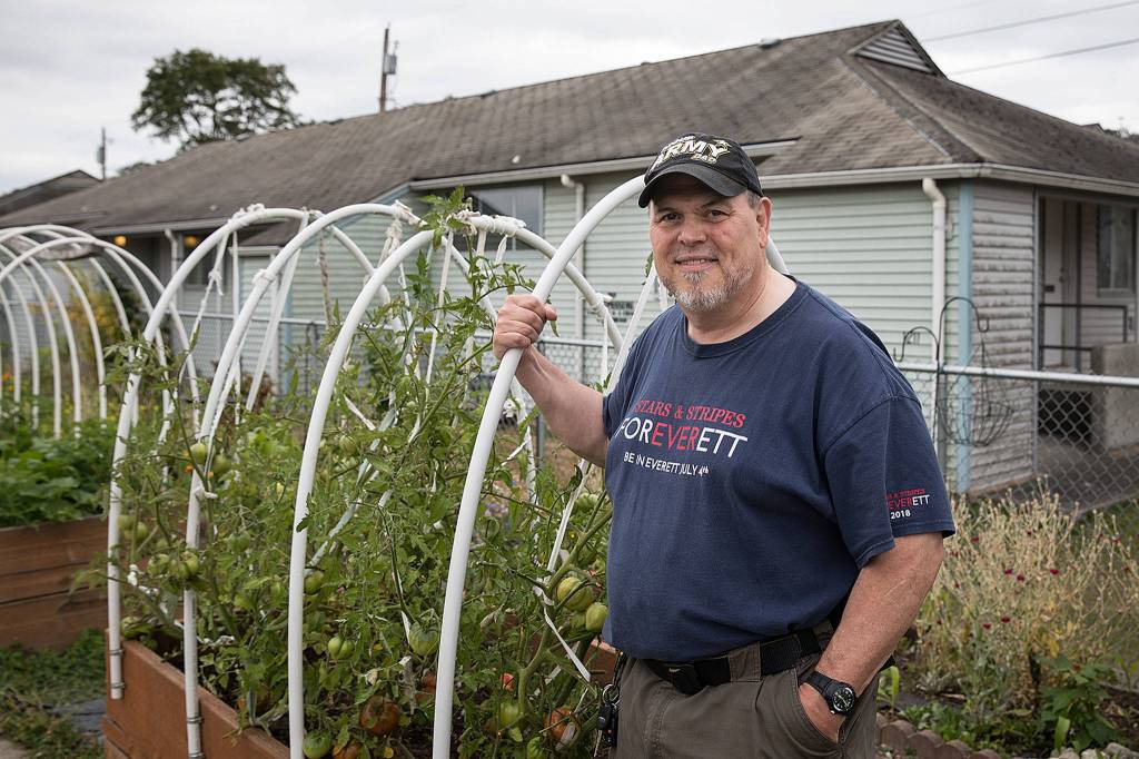 Michael Hill lived next door to the Friendship Garden at Baker Heights. Its not only developed into a garden but a community asset, Hill said. (Lizz Giordano / The Herald)