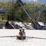Rowers on the Snohomish River pass the sinking hull of the Hannah Marie, formerly known as the Midas, on Wednesday, Aug. 14, 2019 in Everett, Wash. On Monday night, the boats owner towed the boat about half a mile upriver. The Hannah Marie lodged into the bank at about a 30 degree angle and took on water. The state seized the Hannah Marie on Wednesday and is seeking bids for a company to get rid of it. The removal process could start Aug. 28. (Andy Bronson / The Herald)