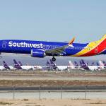 In this March 23 photo, a Southwest Airlines Boeing 737 Max aircraft lands at the Southern California Logistics Airport in the high desert town of Victorville, California. (AP Photo/Matt Hartman, File)