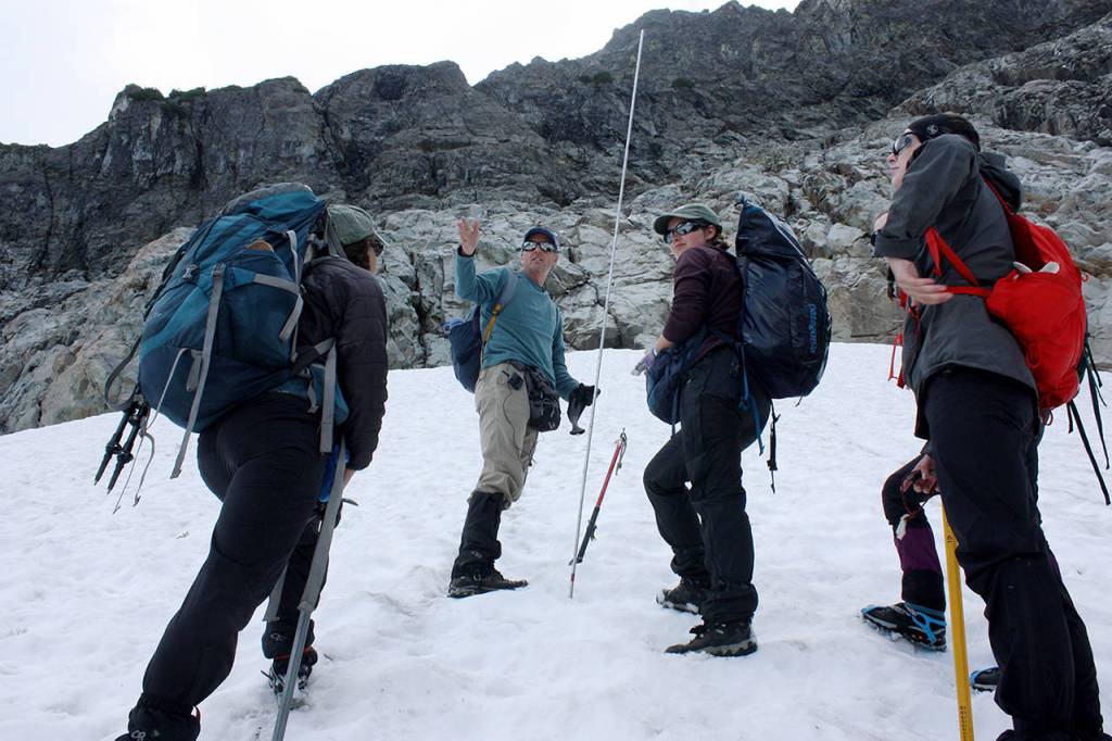 This years North Cascades Climate Project team stands on an avalanche deposit. From left, Abby Hudak, Mauri Pelto, Jill Pelto, Ann Hill and Clara Deck. (Zachariah Bryan / The Herald)