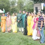 A group poses for a photo at the second annual UTSAV Mela. Its a festival that celebrates South Asian cultures and aims to share traditional dances, food and fashion with area locals. (Julia-Grace Sanders / The Herald)