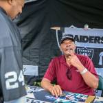 Former NFL defensive lineman Otis Sistrunk (right), talks with Mike Fluker during the Bill Baker Memorial Steel & Wheel Supershow on Saturday at Machinists Union Hall in Everett. (Kevin Clark / The Herald)