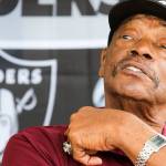 Otis Sistrunk, former NFL defensive lineman, talks with guests to his tent during the Bill Baker Memorial Steel and Wheel Car Show Saturday morning at Everett Machinists Hall in Everett in Everett on August 17, 2019. (Kevin Clark / The Herald)