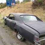 A 1967 Chevelle came loose from a flatbed trailer and crashed into another vehicle Sunday morning on I-5 in Everett. (Washington State Patrol)