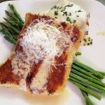 The Alaska cod parmesan has a panko and parmesan crust and came with au gratin potatoes and asparagus. (Sharon Salyer /The Herald)
