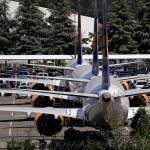 Three grounded Boeing 737 MAX airplanes, built for Icelandair, sit parked in a lot normally used for cars in an area adjacent to Boeing Field on Aug. 15 in Seattle. (AP Photo/Elaine Thompson)