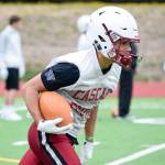 Senior running back Davanta Murphy-McMillian practices running drills at Cascade High School on Wednesday, Aug. 21. (Katie Webber / The Herald)
