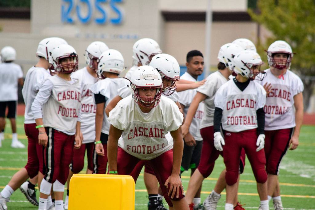 Junior Miles Fabre waits for a defensive drill to start at Cascade High School on Wednesday, Aug. 21. (Katie Webber / The Herald)