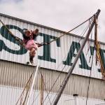 Molly Hiller, 9, performs a back flip on the Power Jump during the opening day of the Evergreen State Fair on Thursday, Aug. 22, 2019 in Monroe, Wash. (Andy Bronson / The Herald)
