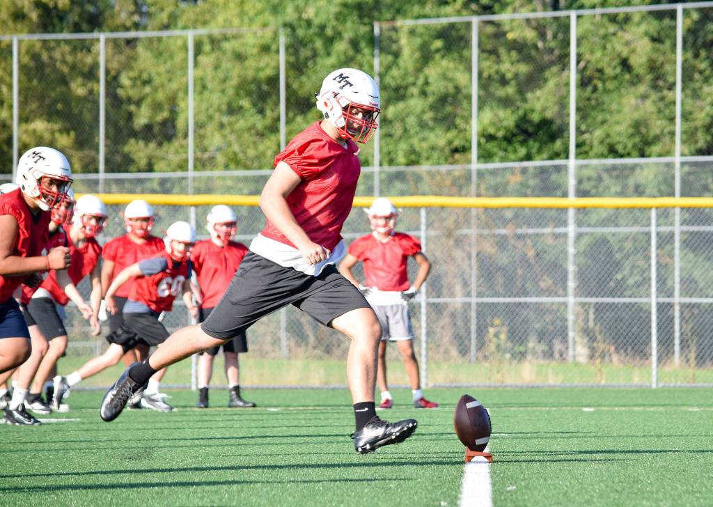 Senior Noah Thompson practices kick-offs at Mountlake Terrace High School on Thursday, Aug. 22. (Katie Webber / The Herald)