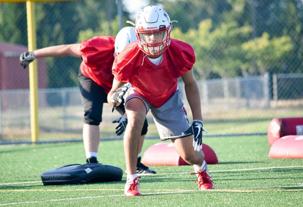 Junior Jai Nath practices stances at Mountlake Terrace High School on Thursday, Aug. 22. (Katie Webber / The Herald)