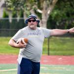 Sultan head coach Rick Rudd points as he explains a drill to his team during practice on Aug. 23, 2019, at Sultan High School. (Katie Webber / The Herald)