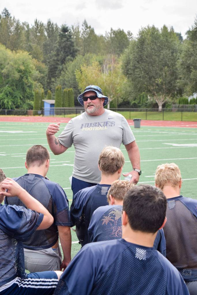 Sultan head coach Rick Rudd gives his team final thoughts at the end of practice on Aug. 23, 2019, at Sultan High School. (Katie Webber / The Herald)