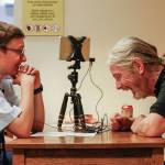 At the Everett Public Library, Vietnam War veteran Bradley Andrews, 69, begins telling his story to Civil Air Patrol members Zachary Colburn, 14 (foreground), and Kenneth Butcher, 15. (Dan Bates / The Herald)