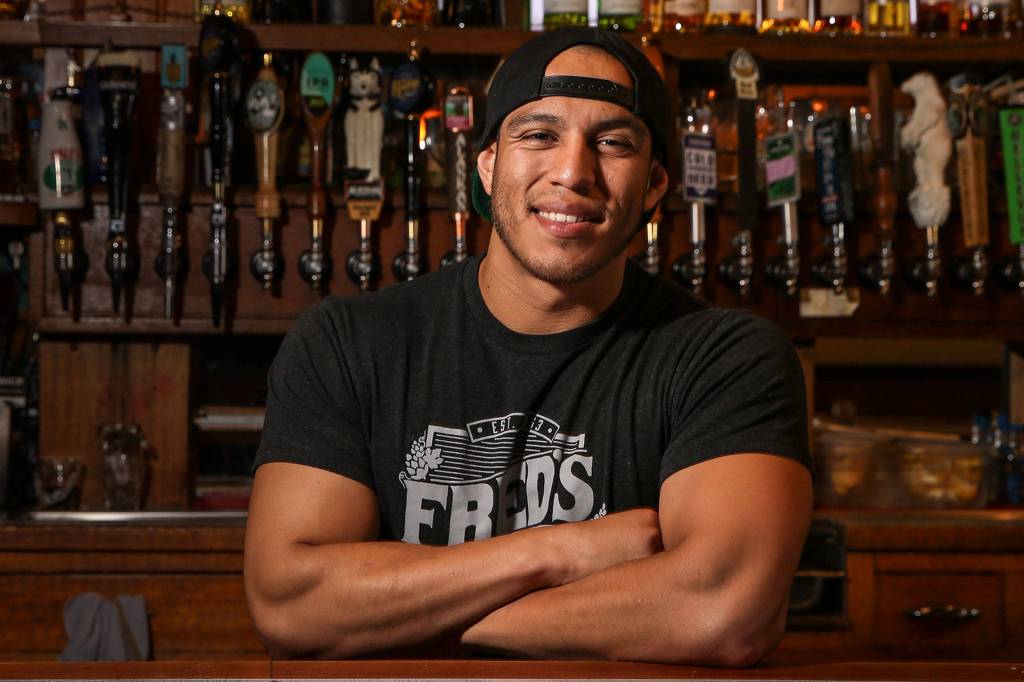 Jason Castro has been a bartender at Freds Rivertown Alehouse for more than 3 years. (Kevin Clark / The Herald)