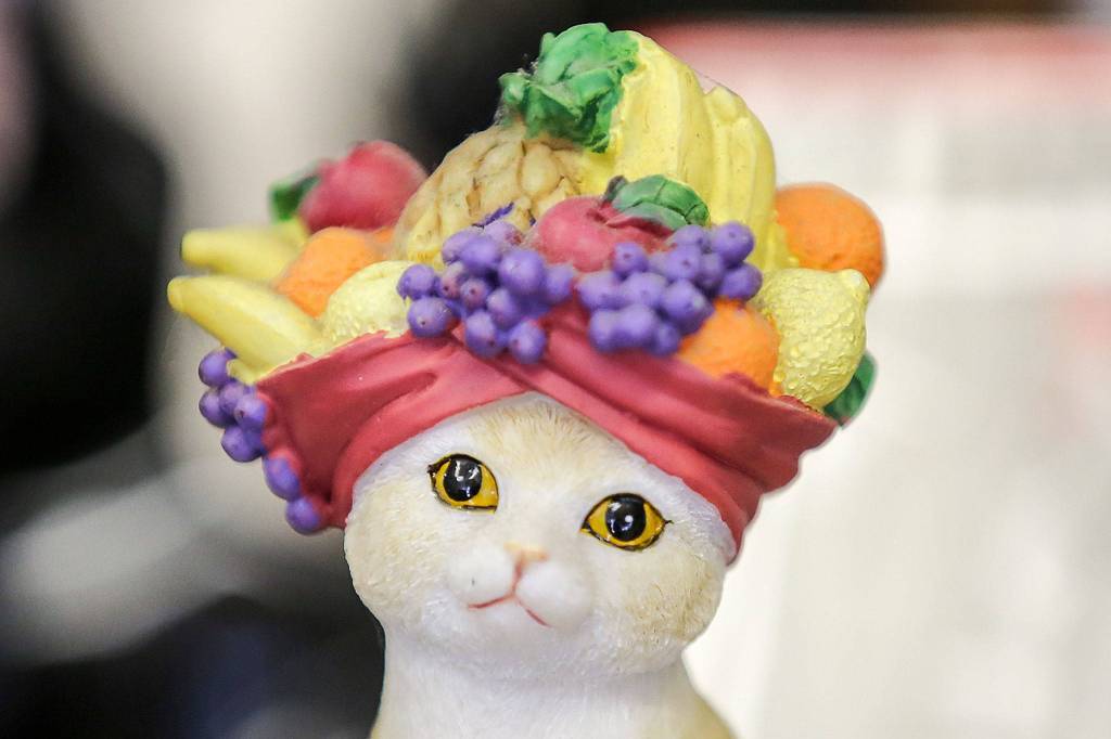 Andersen Insurance of Everett is home to a lot of cat figurines. (Kevin Clark / The Herald)