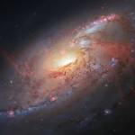 This file image made by the NASA/ESA Hubble Space Telescope shows M106 with additional information captured by amateur astronomers. Despite years of legal battles and months of protests by Native Hawaiian opponents, the international coalition that wants to build the worlds largest telescope in Hawaii insists that the islands highest peak, Mauna Kea, is the best place for their $1.4 billion instrument. Thirty Meter Telescope officials say their new instrument will produce images that are 12 times sharper than the Hubble Space Telescope. (STScI/AURA), R. Gendler via AP, File)