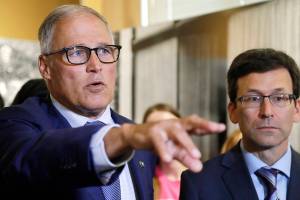 A veto too far? Lawmakers may sue Inslee to figure it out