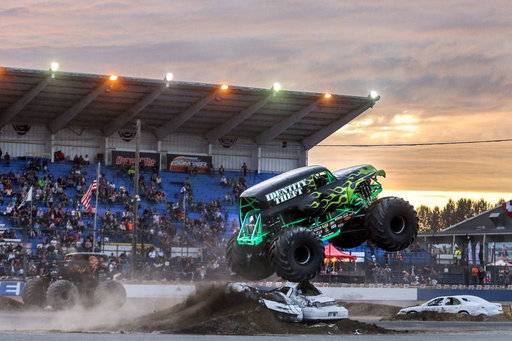 Identity Theft, driven by Marivn Anderson, jumps an obstacle at the Evergreen Speedway in Monroe on Aug. 23. (Kevin Clark / The Herald)