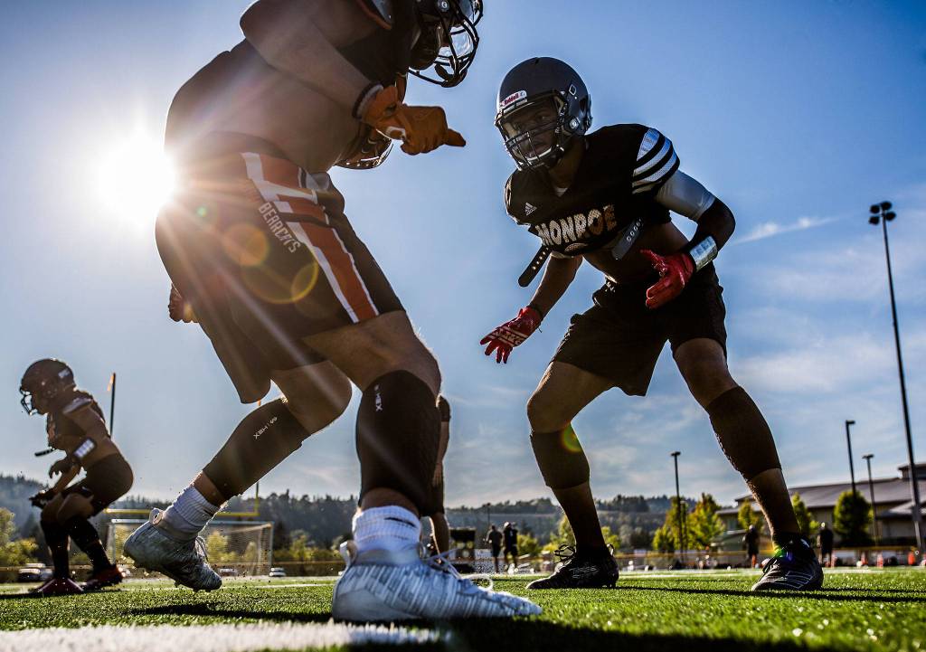 J.R. Little runs through football practice at Monroe High School on Aug. 28. (Olivia Vanni / The Herald)