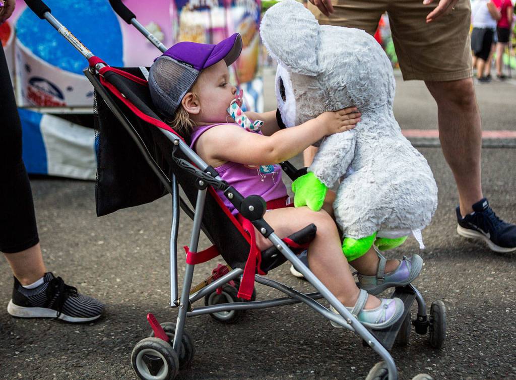 Emily Bell, 1, holds a stuffed animal at the Evergreen State Fair on Sunday, Sept. 1, 2019 in Monroe, Wash. (Olivia Vanni / The Herald)