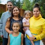 Anthony Catalfamo Jr. (from left), Alexes Catalfamo, Victoria Catalfamo, 8, Rosalie Catalfamo, 4, and Vanessa Morales, 15, at their home in Everett. A family used to downfalls finally hit a windfall. (Olivia Vanni / The Herald)